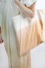 Load image into Gallery viewer, A minimalist designer tote bag with a few inner pockets for ease of use. Design and Crafted by Xiapism Natural Dye Sustainable Lifestlye
